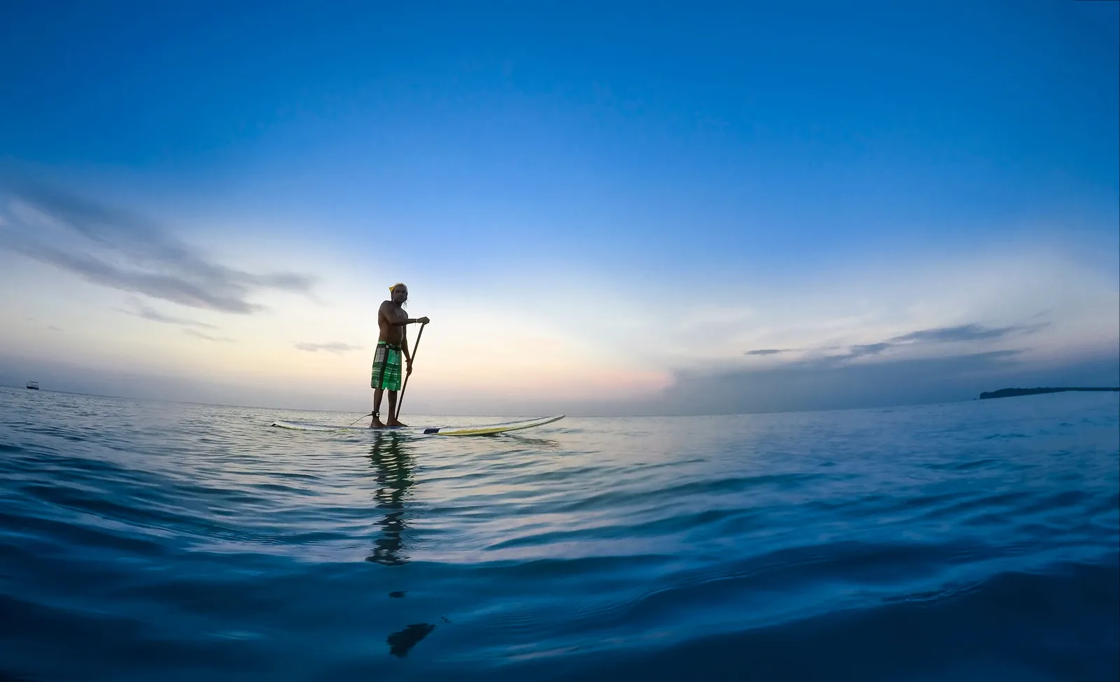 Turquoise waters and pristine coastline of Sri Lanka under golden tropical sunshine