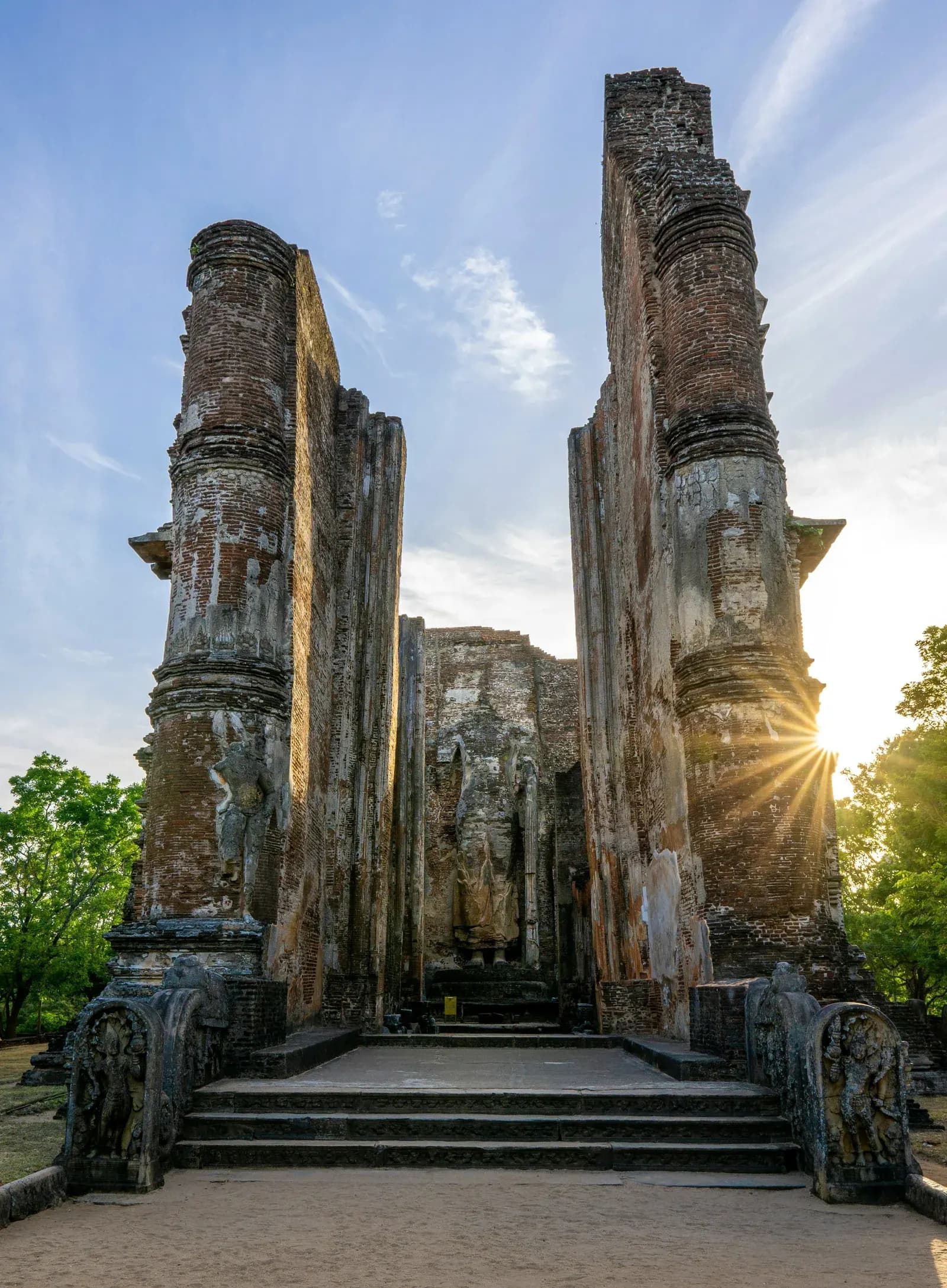 Ancient rock-carved Buddha statue radiating tranquility and timeless spiritual devotion.